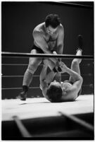 Heavyweight wrestler El Pulpo grappling with an opponent at the Olympic Auditorium, Los Angeles, 1937