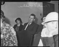 Frank E. Walker, father of murder victim Frances Walker, sits in a crowded room, Los Angeles, 1935