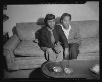 Demonstrators rest during a discriminatory housing protest, Los Angeles, 1945