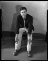 Thomas Edward Dugger, also known as "Ape Man", poses while on trial for assaulting three women, Los Angeles, 1935-1936