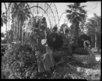 "Rose Queen" float with Barbara Nichols and her court on a float at the Tournament of Roses Parade, Pasadena, California, 1936