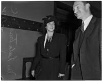 Lula Truschel, wife of Culver City Chief of Police C.T. Truschel, walks out of the courtroom after winning a divorce suit against her husband, Los Angeles, 1940