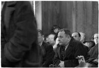 Police Captain Earle E. Kynette sits in court after being charged with conspiracy to commit murder, Los Angeles, 1938