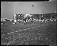 Football game between the Los Angeles Bulldogs and the Rochester Tigers at Gilmore Stadium, Los Angeles, November 14, 1937