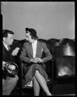 Heiress Nancy Pierson Brooks Macy Brill sitting next to an unidentified man, Los Angeles, 1937