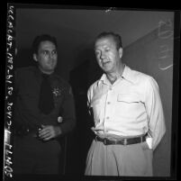 Dr. Eric Kirk and Sheriff L.L. McGillan during grand jury abortion investigation, Los Angeles, Calif., 1950