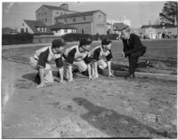 Dean Cromwell coaching new players on the Los Angeles Angels baseball team, Los Angeles, 1940