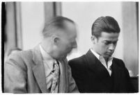 Louis Rude Payne and Dist. Atty. Buron Fitts at Payne's inquest for the murder of his mother and younger brother, Los Angeles, June 6, 1934