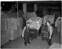 Employees at The May Co. prepare merchandise for downtown Dollar Day, Los Angeles, 1940