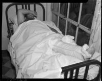 Wrestler Man Mountain Dean in bed with a broken leg, Los Angeles, 1937