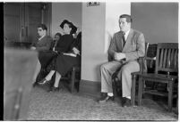 Private detective Pearl Antibus appears in court with her daughter Norma Thelan and son Robert Antibus during her trial against millionaire Thomas W. Warner, Sr, Los Angeles, 1938