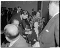 Charles Hardaker comforts his wife Betty Flay Hardaker who was convicted of murdering their daughter, Los Angeles, 1940