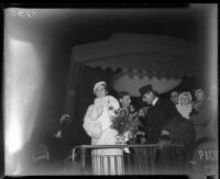 Evangelist Aimee Semple McPherson at the back of a railway car