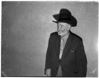 Cowboy film extra Tex Driscoll at hearing of Jerome (Blackjack) Ward, charged with the murder of Johnny Tyke, Los Angeles, February 27, 1940