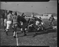 Football game between the Los Angeles Bulldogs and the Rochester Tigers at Gilmore Stadium, Los Angeles, November 14, 1937