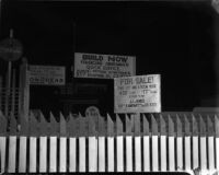 Signs on Riverside Drive which was affected by a landslide in Elysian Park, Los Angeles, November 1937