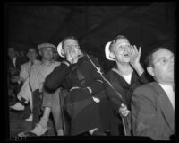 Sailors cheering at a wrestling event, Los Angeles, 1936