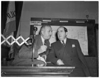 Dr. George K. Dazey and his attorney, Jerry Giesler, at the trial where Dr. Dazey is accused of the murder of his second wife, Doris S. Dazey, Los Angeles, 1939-1940