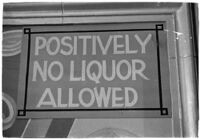 Sign detailing policies hanging inside of a casino, Los Angeles, 1937