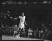 Richard Gonzales plays a tennis match