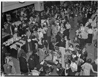 Crowd shops at department store during Dollar Day sale, Los Angeles, 1935