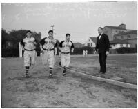 Dean Cromwell coaching new players on the Los Angeles Angels baseball team, Los Angeles, 1940