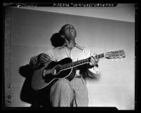 Josh White, singer and guitarist, circa 1947