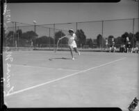 Louise Martin plays tennis, Los Angeles, 1930s