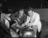 Race car drivers Rex Mays and Bob Swanson pose at the Legion Ascot speedway, Los Angeles, 1935