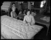 Woman sewing mattress in California State Emergency Relief Administration work program, 1935