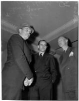 Loyola Marymount head football coach Tom Lieb with team member Walter Christensen and attorney Charles Gass, Los Angeles