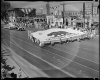 California citizens carrying a huge state flag in the Admission Day parade, Santa Monica, September 9, 1937