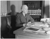 Judge Stanley Moffatt at his desk, Huntington Park