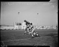 Western League championship football game between Fairfax and L.A. High Schools at Gilmore Stadium, Los Angeles, November 5, 1937