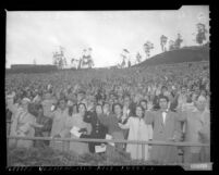 New U.S. citizens take oath of allegiance in mass ceremony at Hollywood Bowl, Calif., 1954