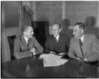 Photograph of Charles P. Schottland, Roy W. Pilling, and Archibald Young, administrators of Los Angeles' and California's state relief organizations during the Great Depression