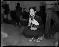 Woman and dog supporting the C.I.O. at a strike rally, Santa Monica, 1937