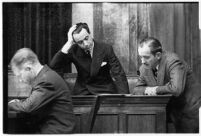 Accused murderer Paul A. Wright being questioned in court, Los Angeles, 1938