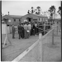 Veterans line up for a surplus truck and trailer sale put on by the War Assets Administration, Port Hueneme, May 1946