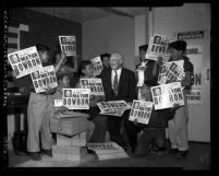 Fletcher Bowron with group of Latino boys holding up campaign signs reading "Re-Elect Mayor Bowron" in Los Angeles, 1953