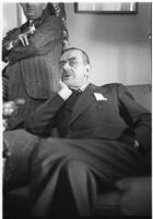 German author Thomas Mann seated in a chair, Los Angeles