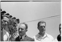 Russian aviators meet the press after breaking the non-stop flight record, flying from Moscow to San Jacinto, CA. July 14, 1937