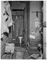 Inside a home in the slums, Los Angeles, 1925-1945