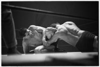 Heavyweight champion Dean Detton wrestling an opponent at the Olympic Auditorium, Los Angeles, 1937