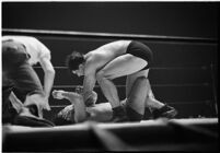 Heavyweight wrestler El Pulpo grappling with an opponent at the Olympic Auditorium, Los Angeles, 1937