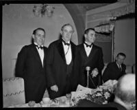 John Anson Ford, Tom Connolly and Peirson M. Hall dressed in tuxedos at a banquet, Los Angeles, 1930s