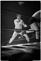 Wrestling match between Italian newcomer Vincent Austeri and Salt Lake City native Del Kunkel at Olympic Auditorium, Los Angeles, 1938