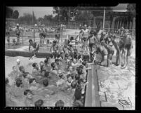 Group of boys at a pool for the 1941 Los Angeles Daily News swimming contest