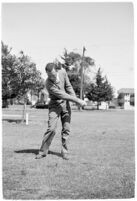 Golfer Fay Coleman demonstrates a series of "right" and "wrong" golf swings