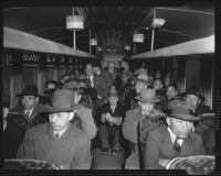 Japanese nationals on a bus during evacuation and relocation